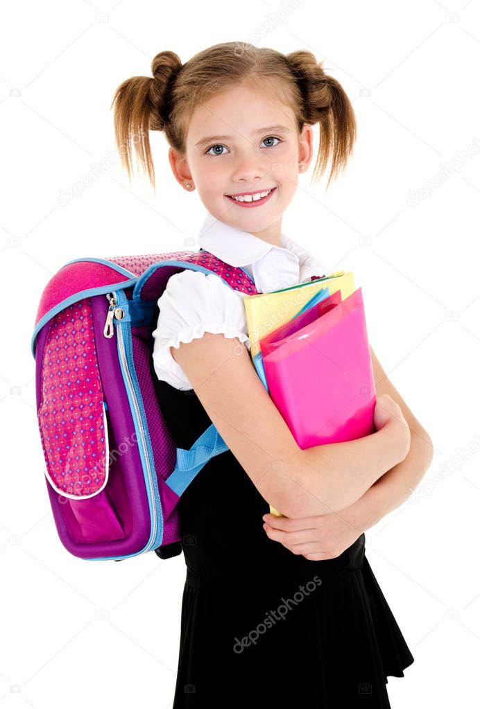 Portrait of smiling school girl child with backpack and books in