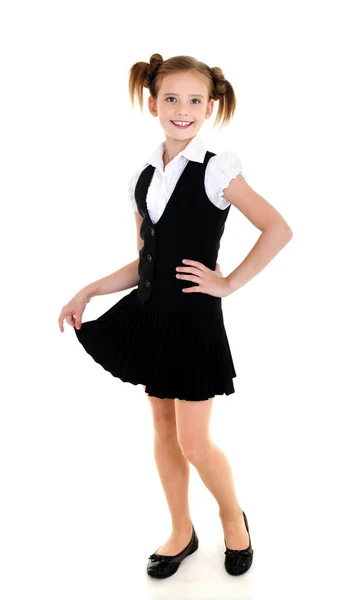 Retrato de criança menina da escola feliz sorridente em uniforme isolado — Fotografia de Stock