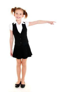 Sağdaki tek tip gösteren gülümseyen mutlu okul kız çocuk 