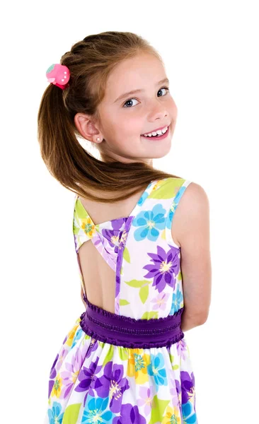 Sevimli gülümseyen küçük kız çocuğu geri izole 