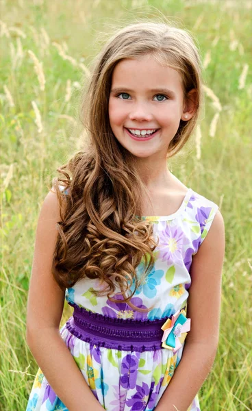 Adorable smiling little girl child in summer day — Stock Photo, Image