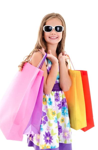 Bedårande liten flicka barn solglasögon håller shopping färgglada — Stockfoto