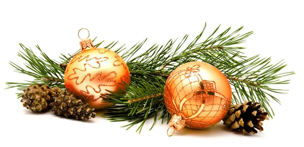 Christmas decoration golden yellow balls with fir cones — Stock Photo, Image