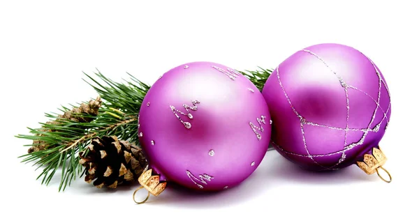 Christmas decoration lilac magenta balls with fir cones and fir — Stock Photo, Image