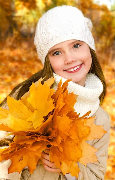 Autumn portrait of adorable little girl in hat — Stock Photo, Image