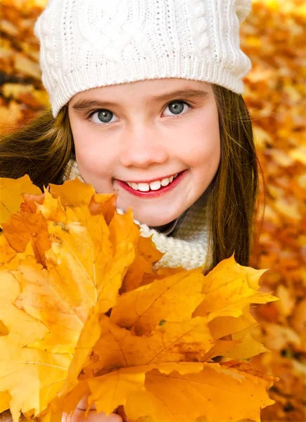 Autumn portrait of adorable little girl in hat — Stock Photo, Image