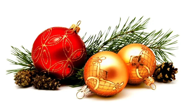 Christmas decoration red golden yellow balls with fir cones — Stock Photo, Image