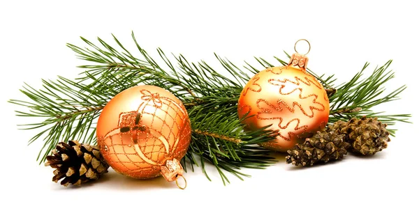 Christmas decoration golden yellow balls with fir cones — Stock Photo, Image