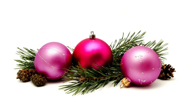 Christmas decoration lilac magenta balls with fir cones — Stock Photo, Image