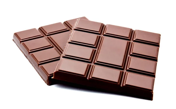 Donkere melkchocolade bars stapel geïsoleerd op een witte — Stockfoto