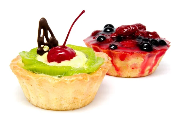 Delicious cakes pastry with fruit raspberry currant kiwi isolate — Stock Photo, Image