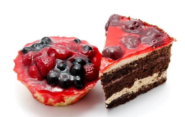 Delicious chocolate cakes pastry with fruit cherry raspberry cur — Stock Photo, Image