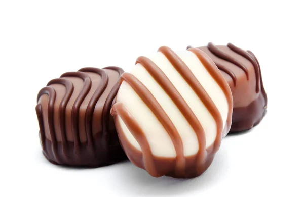 Sortiment an Süßigkeiten aus Schokolade isoliert — Stockfoto