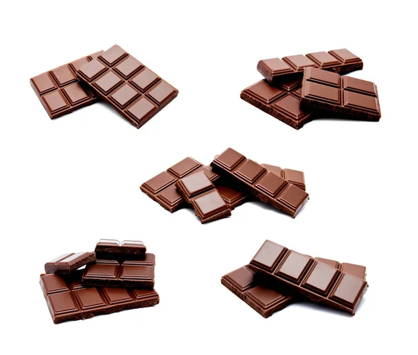 Fotoğraf Karanlık Sütlü Çikolata Bar Yığını Beyaz Bir Arka Plan — Stok fotoğraf