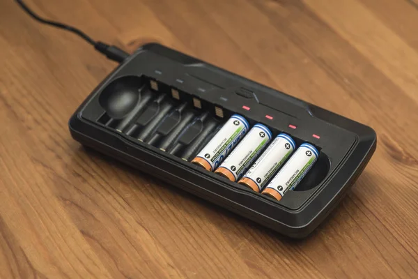 Battery charger and battery charging, battery indicators and burning lights.