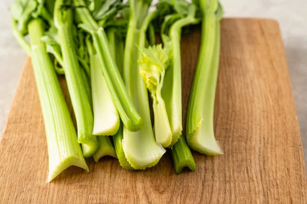 Celery. Leaves and stem of fresh organic green celery close up. Healthy eating, vegetarian food, diet, dieting concept. — Stock Photo, Image