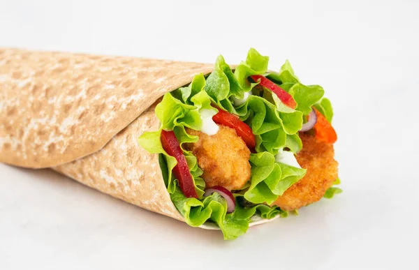 Wrap with fried chicken and vegetables isolated on a white background — Stock Photo, Image