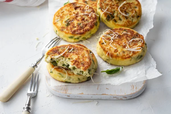 Cottage cheese pancakes with spinach and cheese.
