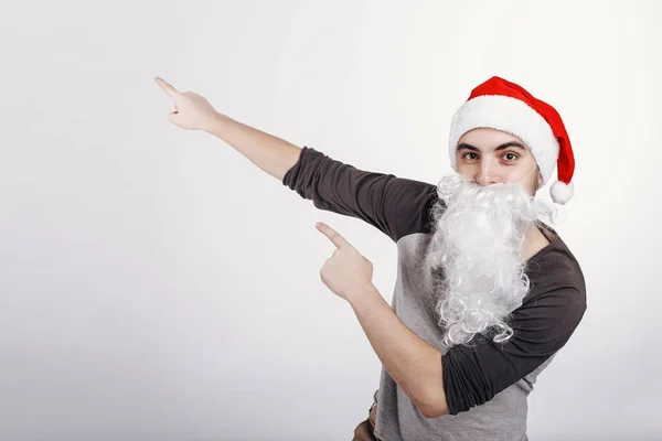 Man Santa Hat White Beard Pointing Something Right Size — Stock Photo, Image