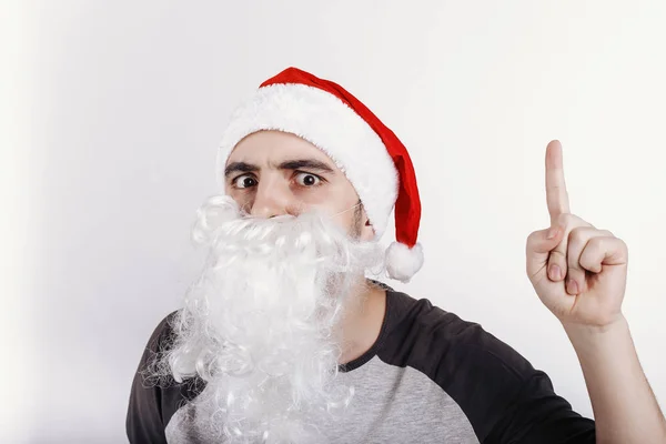 Mannen Santa Hatt Och Med Vitt Skägg Pekar Vikten — Stockfoto
