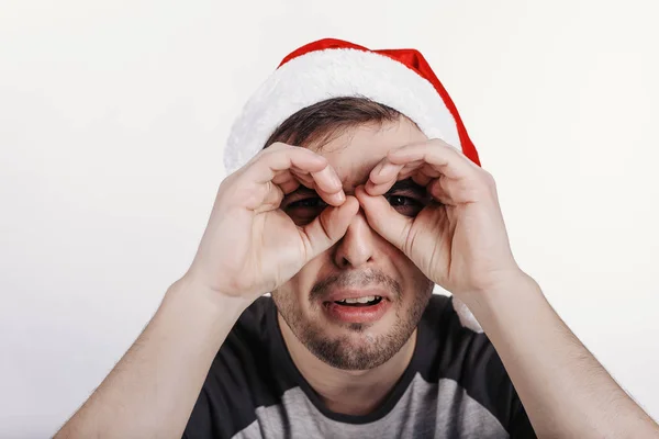 Man Santa Hat Pretending Looking Binoculars — Stock Photo, Image