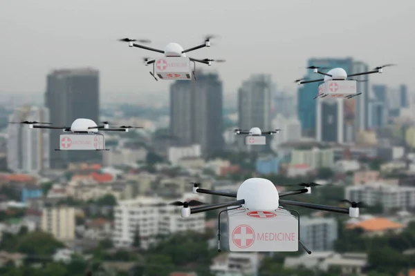 İlk yardım kutusuyla uçan bir grup dron naklediliyor. Arka plan olarak şehir. Acil tıbbi bakım konsepti. 3B Hazırlama.