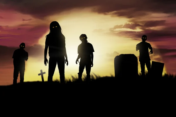 Silhouette zombies on cemetery walking around — Stock Photo, Image