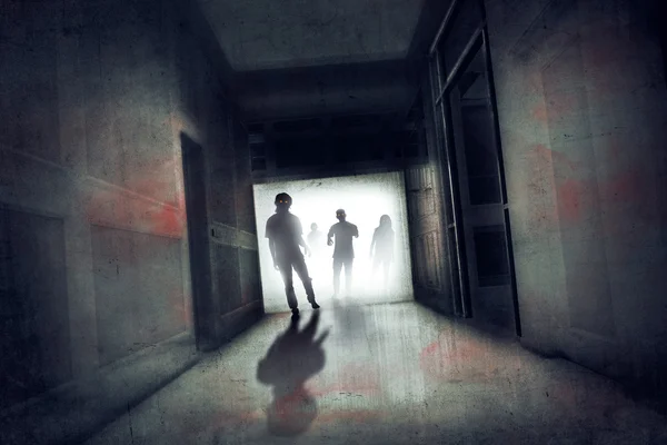 Scary zombies in abandoned building — Stock Photo, Image