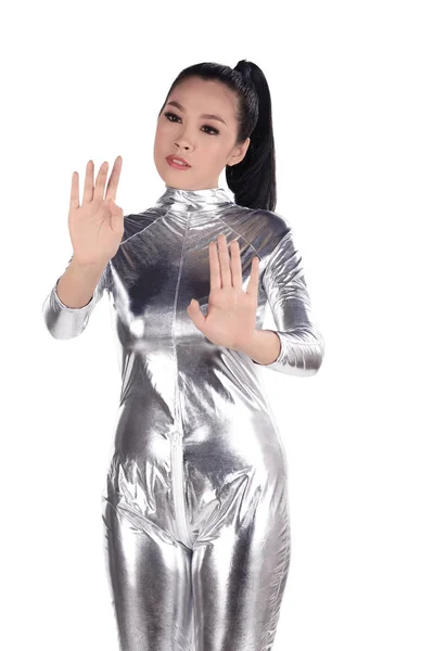 Азиатка в серебряном латексном костюме — стоковое фото