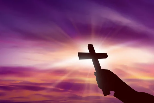 Рука тримає християнський хрест — стокове фото