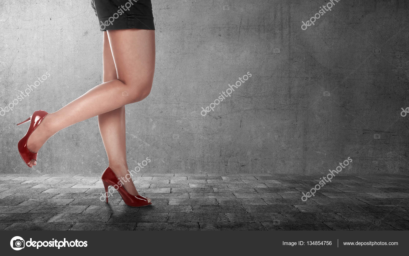 Ankle Chains Around A Woman Legs Wearing High Heels Stock Photo, Picture  and Royalty Free Image. Image 50866466.