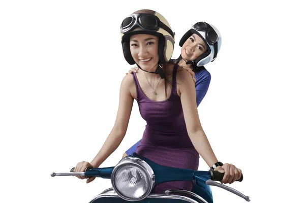 Asian women riding on scooter — Stock Photo, Image