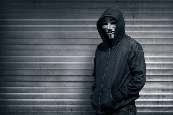 Hacker en máscara y guantes —  Fotos de Stock