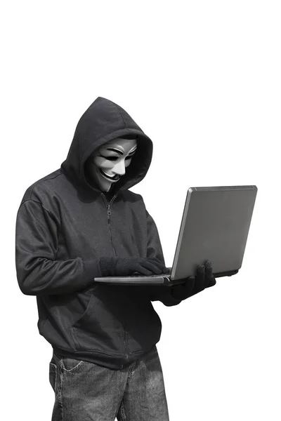 Haker posiadania laptopa — Zdjęcie stockowe