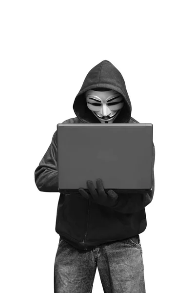 Haker posiadania laptopa — Zdjęcie stockowe