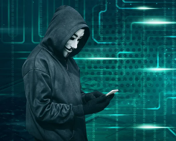 Hacker in mask and gloves — Stock Photo, Image