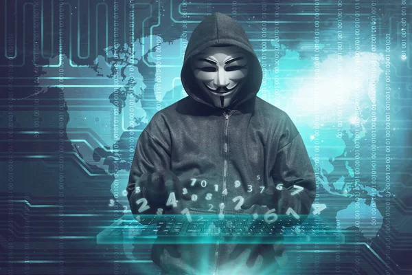 Hacker in mask and gloves — Stock Photo, Image