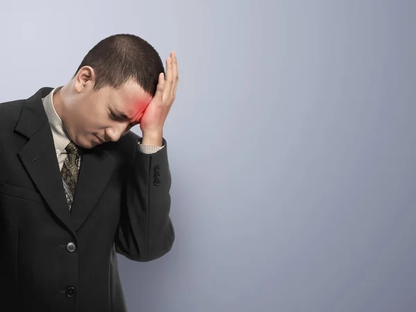 Businessman having headache — Stock Photo, Image