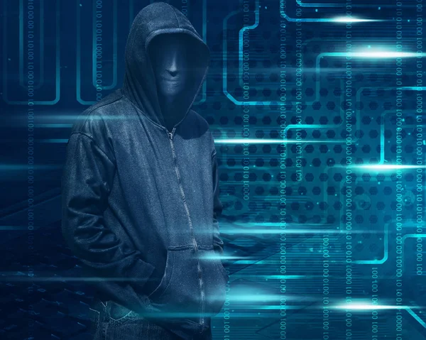 Hacker in masker en handschoenen — Stockfoto