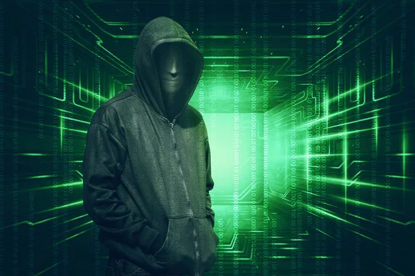 Hacker in masker en handschoenen — Stockfoto