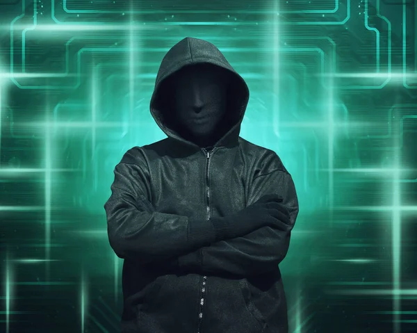 Hacker in mask and gloves — Stock Photo, Image