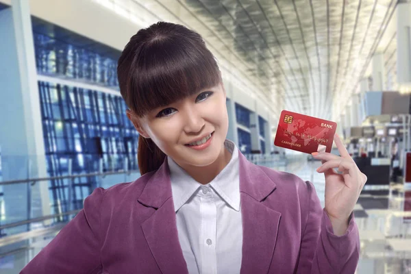 businesswoman showing credit card