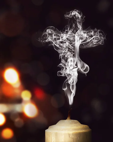 Candle smoke in the shape of a cross — Stock Photo, Image