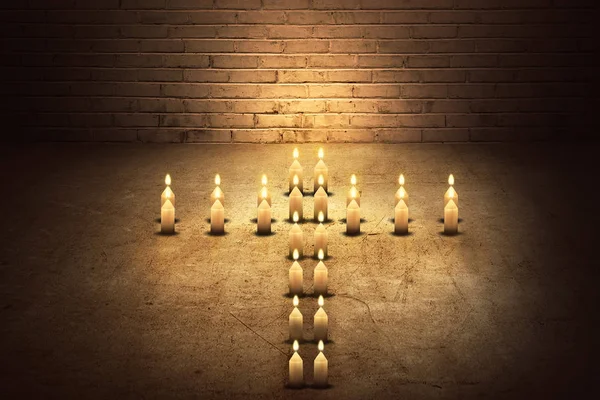 Burning candles in the form of a cross — Stock Photo, Image