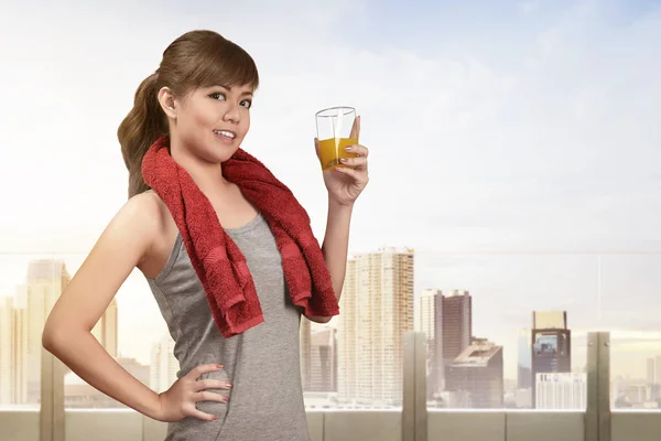 Woman drinking a healthy natural juice — Stock Photo, Image