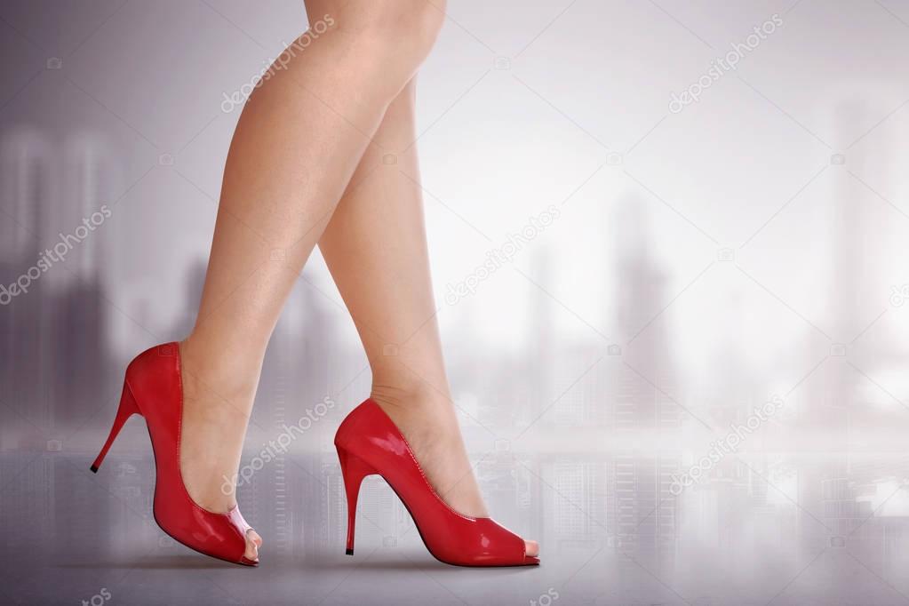 Woman legs with high heel shoes