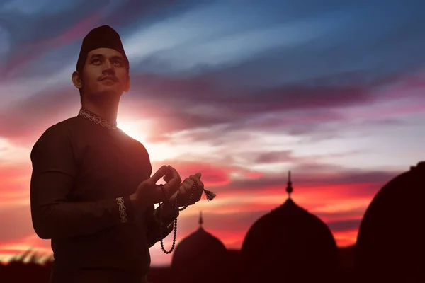 Muslim man praying to god — Stock Photo, Image