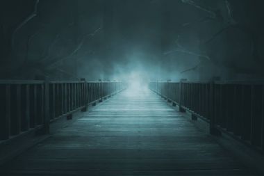Wooden walkways with thick fog