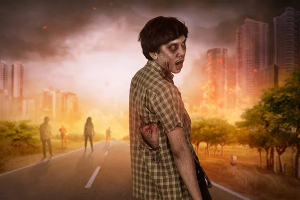 Aggressive asian zombies with blood walking around — Stock Photo, Image