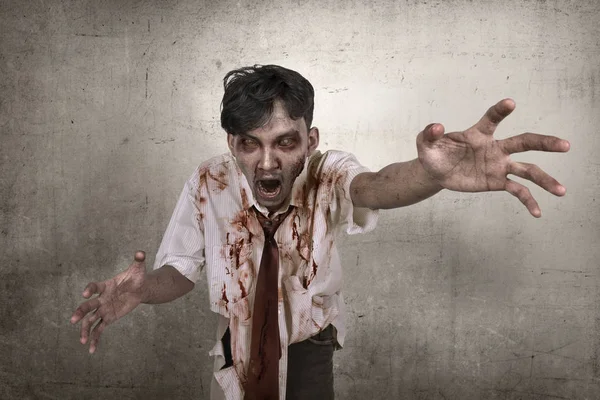 Creepy and bloody asian zombie man reaching to you — Stock Photo, Image